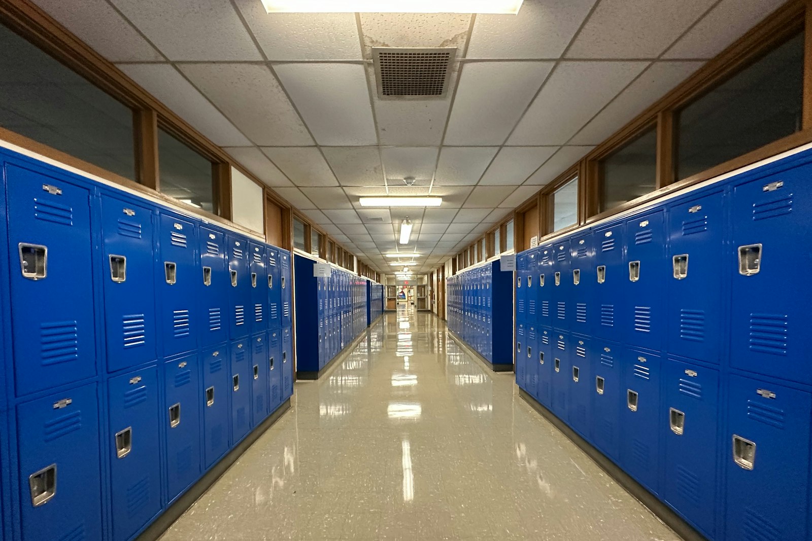 School hallway with blue lockers