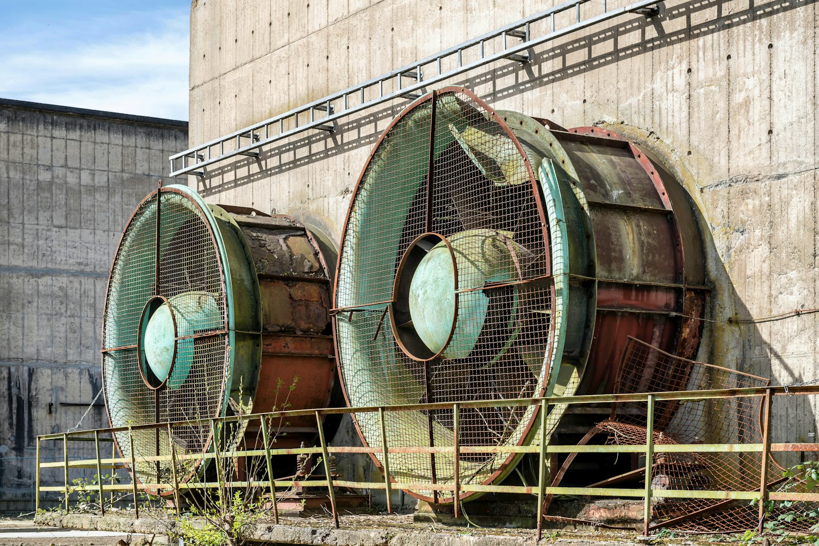 Large industrial fans on a plant wall