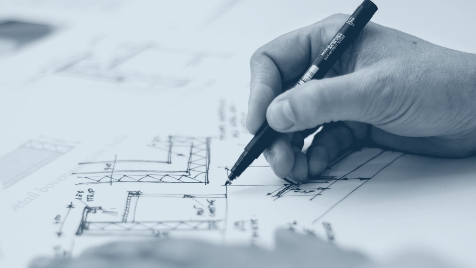 A hand drawing on architectural plans