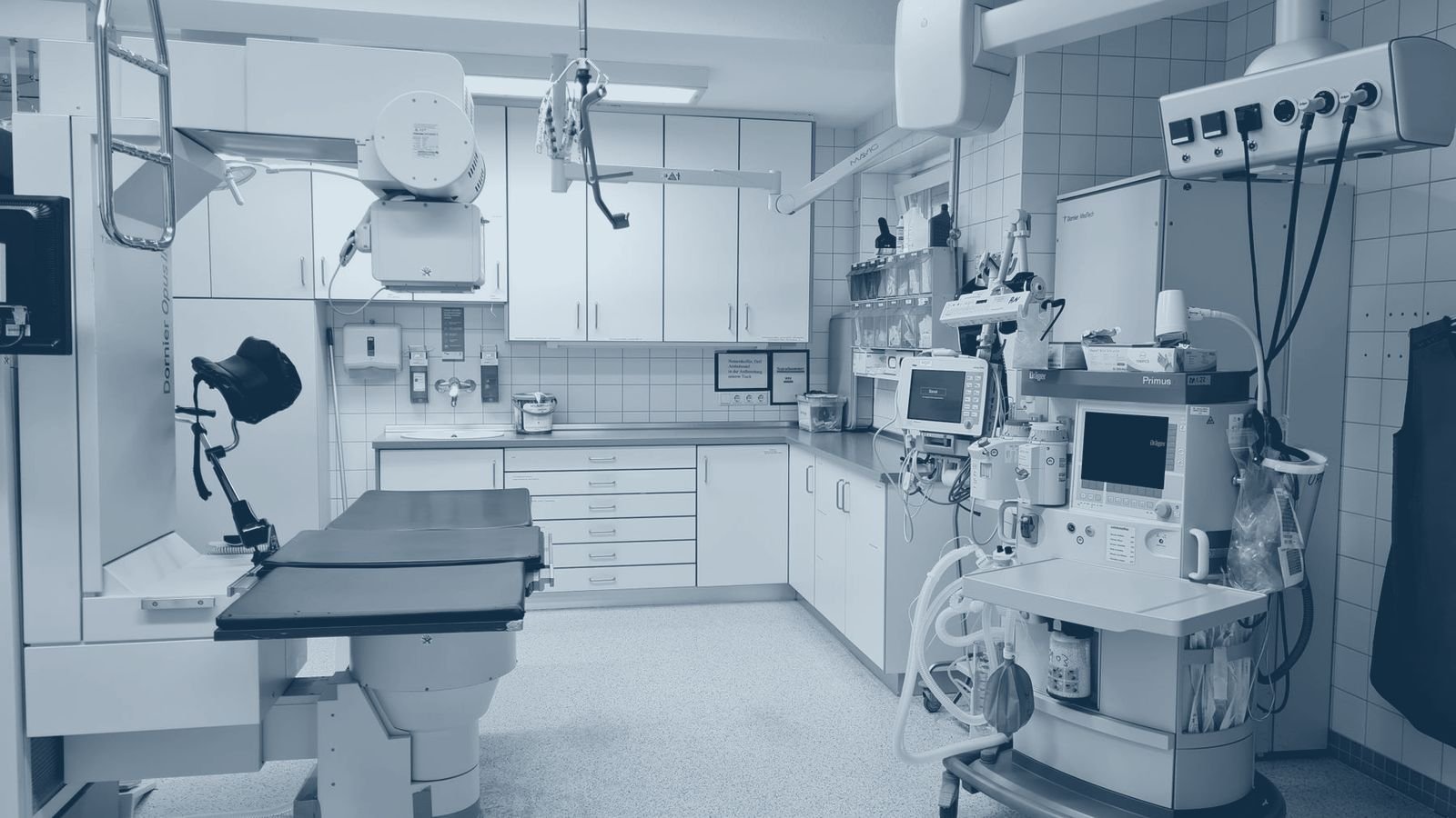 A hospital corridor leading to clinical departments